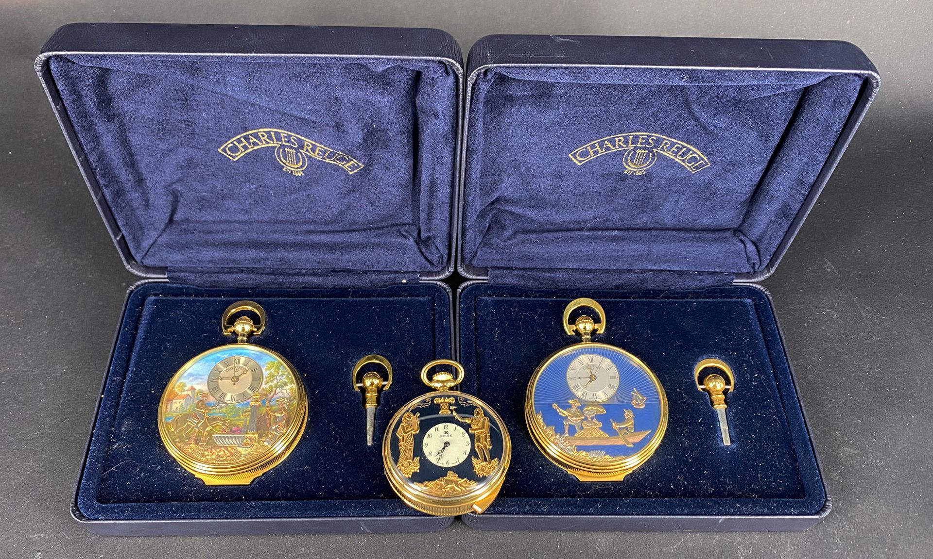 3 Taschenuhren, Reuge und Kelek: 2 TU Charles Reuge (Schweiz) Sainte Croix, Goldplated, mit Spieluhr