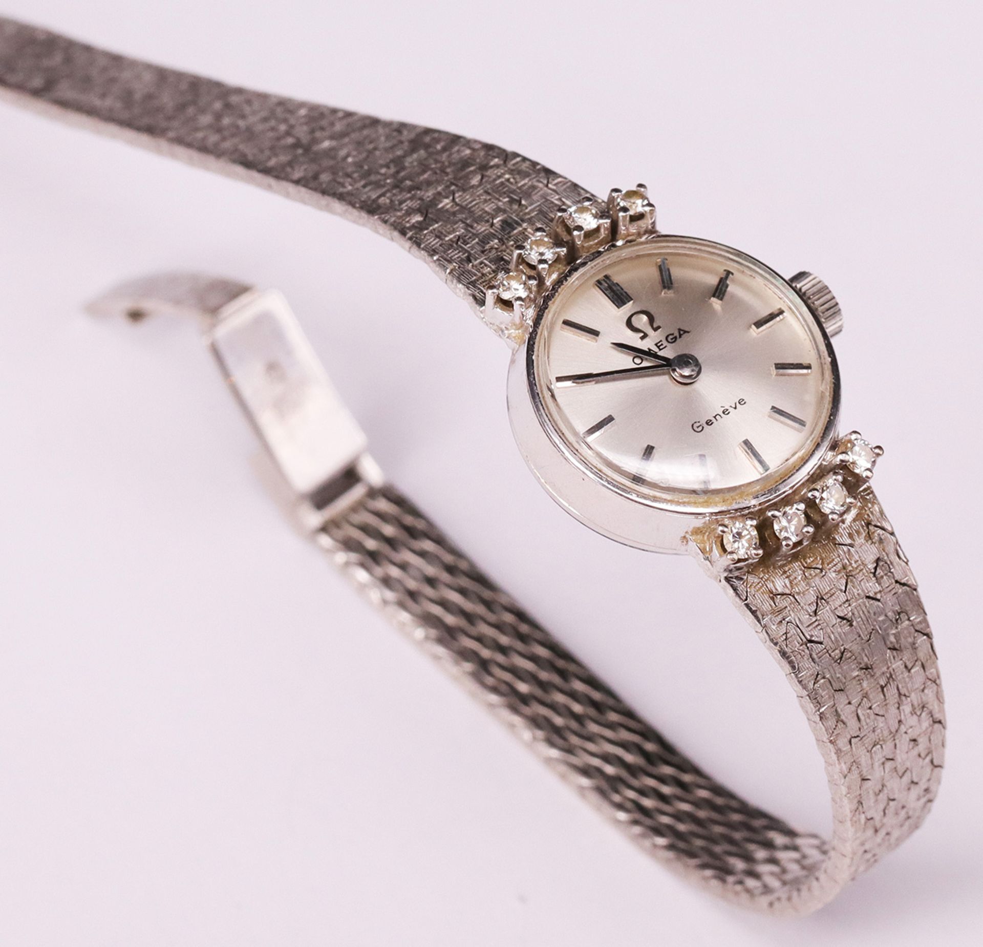 Omega, Damenarmbanduhr, mit Brillanten, 750er WG, L. 18 cm, 32 g