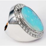 Ring, 750er WG, Handarbeit, mit türkisblauem Opal, 15,5 mm x 24 mm, sowie 28 Brillanten à 0,04 ct,