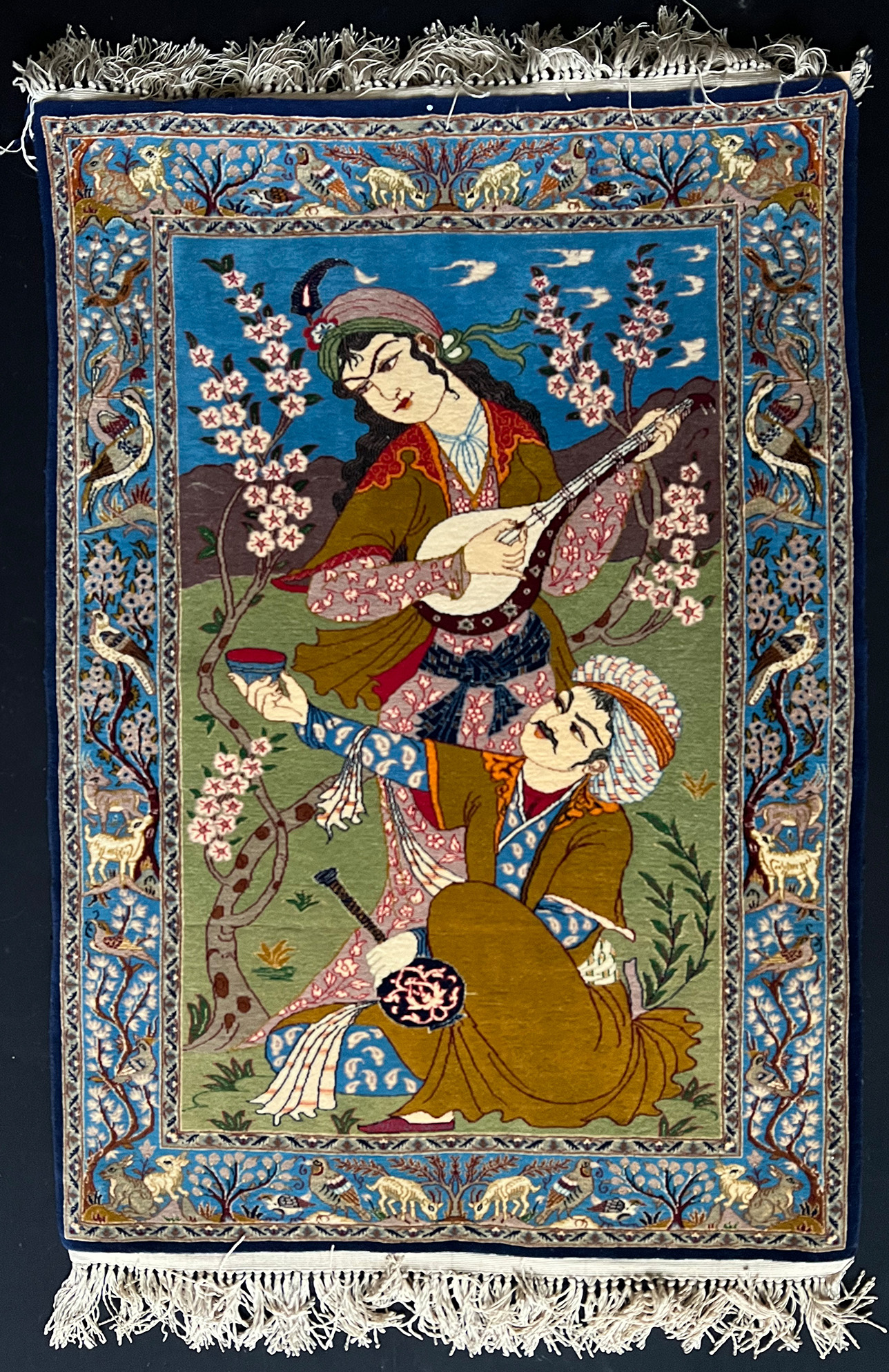 Isfahan, Orientteppich bzw. Wandteppich, mit dem Figurenmotiv einer Mandolinenspielerin und ihrem
