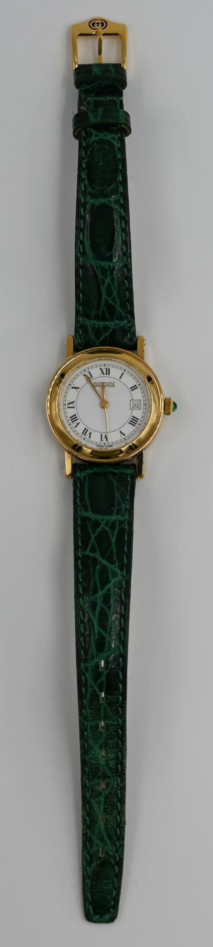 1 Damenarmbanduhr GUCCI, Metall vergoldet, Quartz, grünes Originallederband, Tsp. - Image 2 of 2