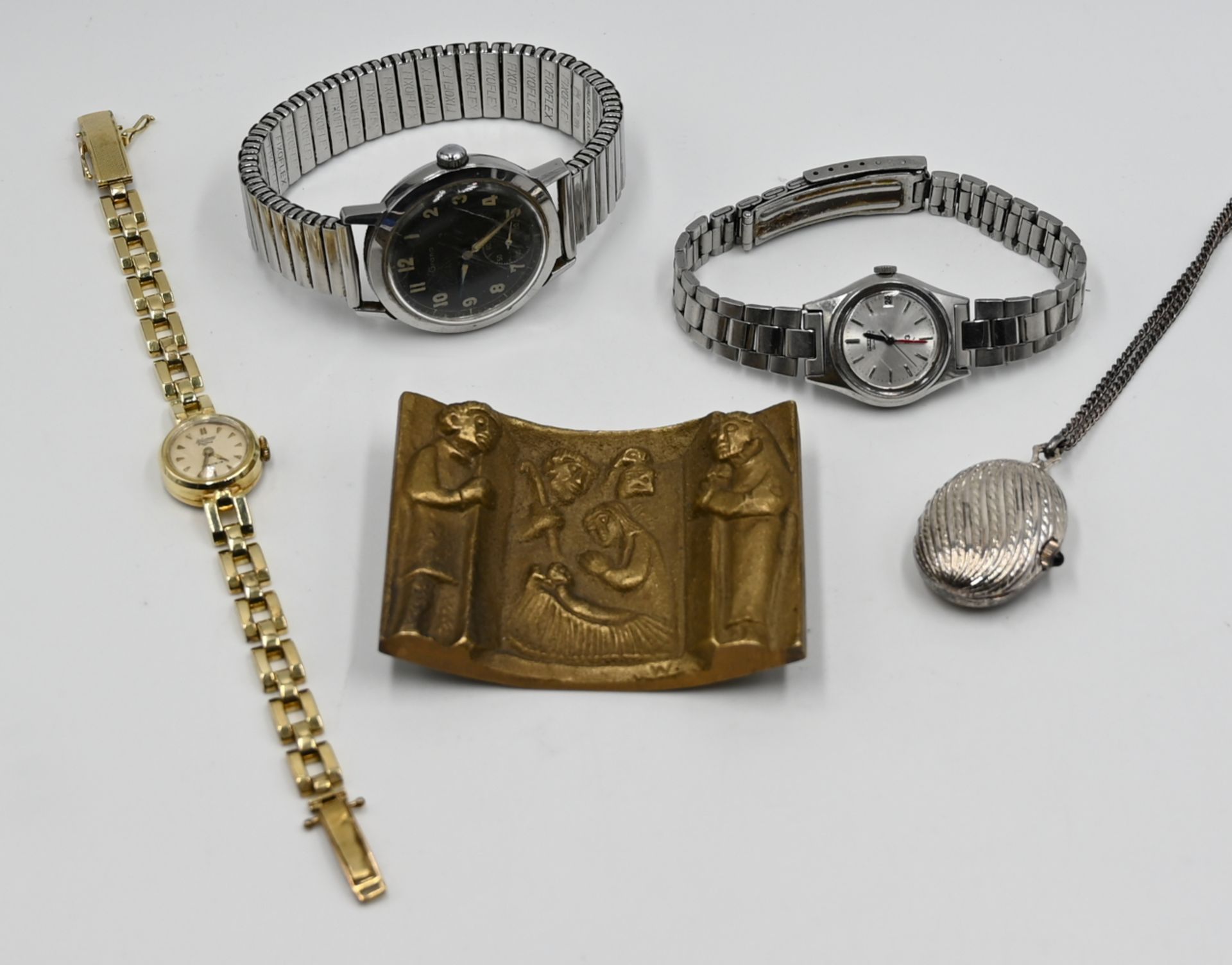1 Damenarmbanduhr GG 14ct. BLUMUS, 2 Armbanduhren Metall SEIKO/GRANA, 1 Hängeuhr mit Kette, je Metal