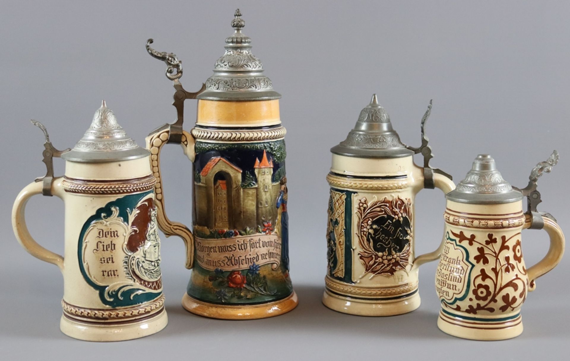 Four Historism beer mugs with pewter lids, early 20th cent, German