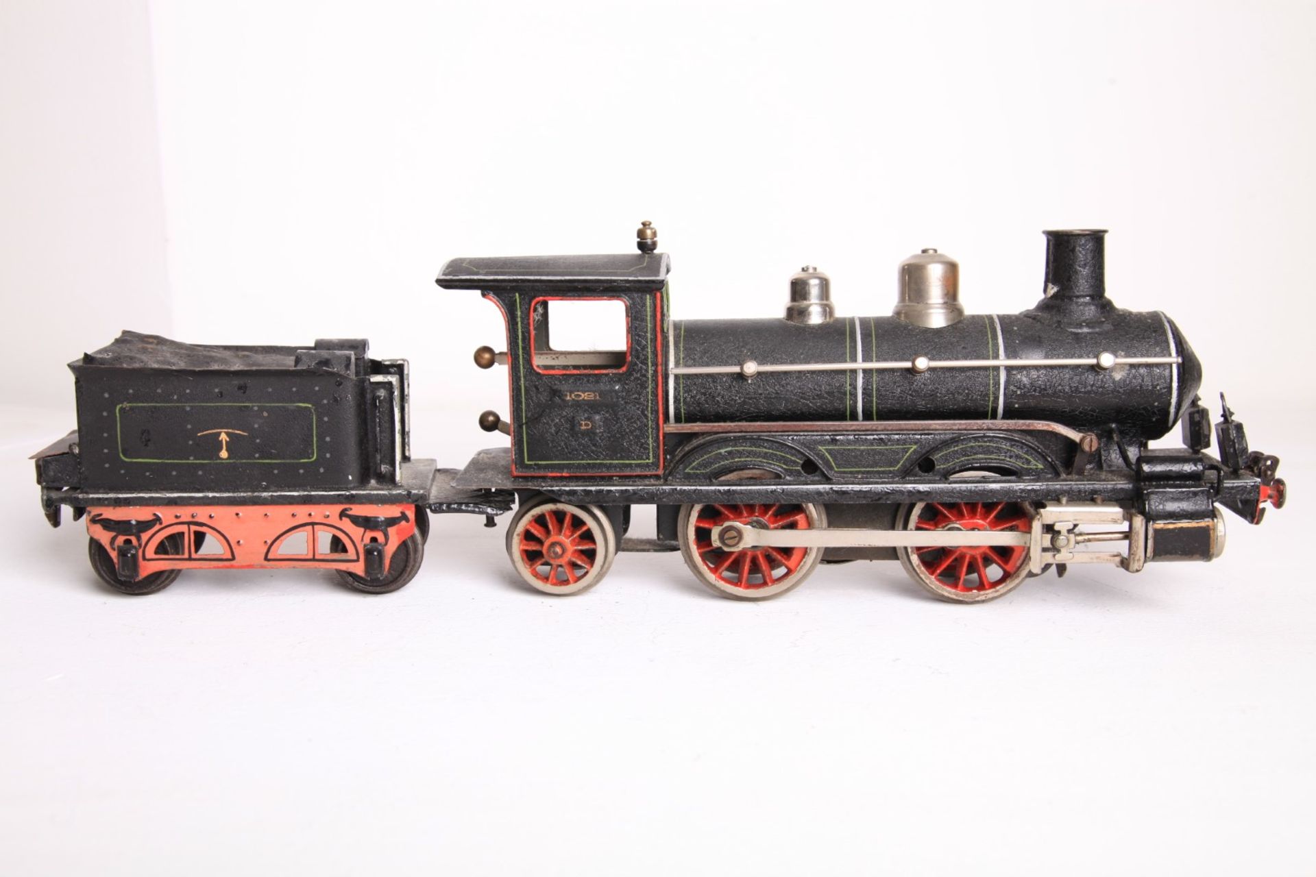 Märklin S 1, D1021 Dampflok mit Tender, Uhrwerk intakt, 1 Stirnlampe fehlt . L45cm Z2