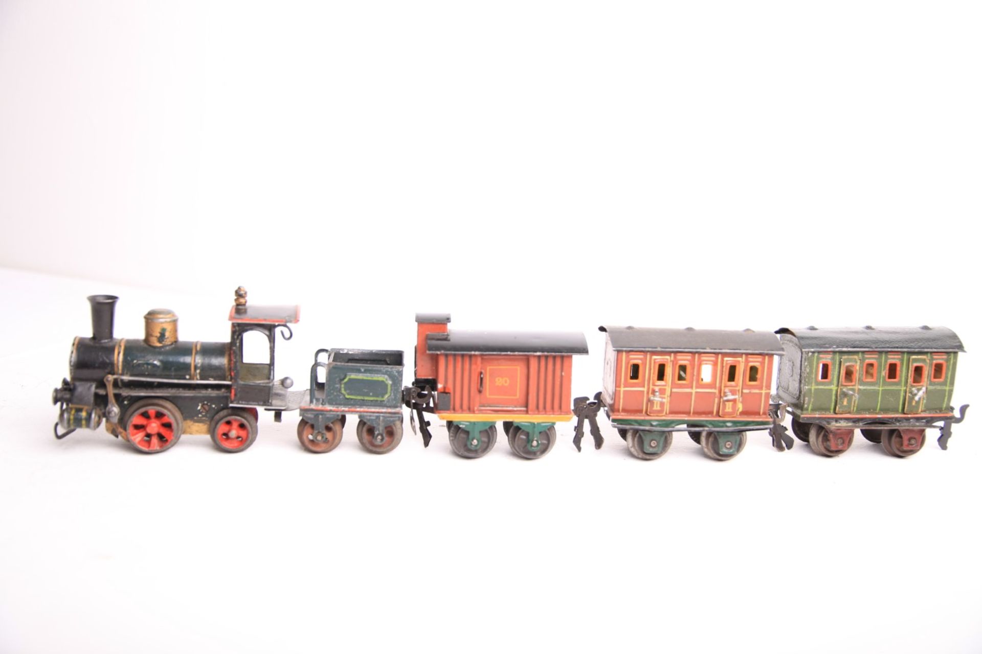 Märklin S 0, Uralt Zug um 1900. 1020B Dampflok mit Tender. Zwei Personenwagen erster und zweiter