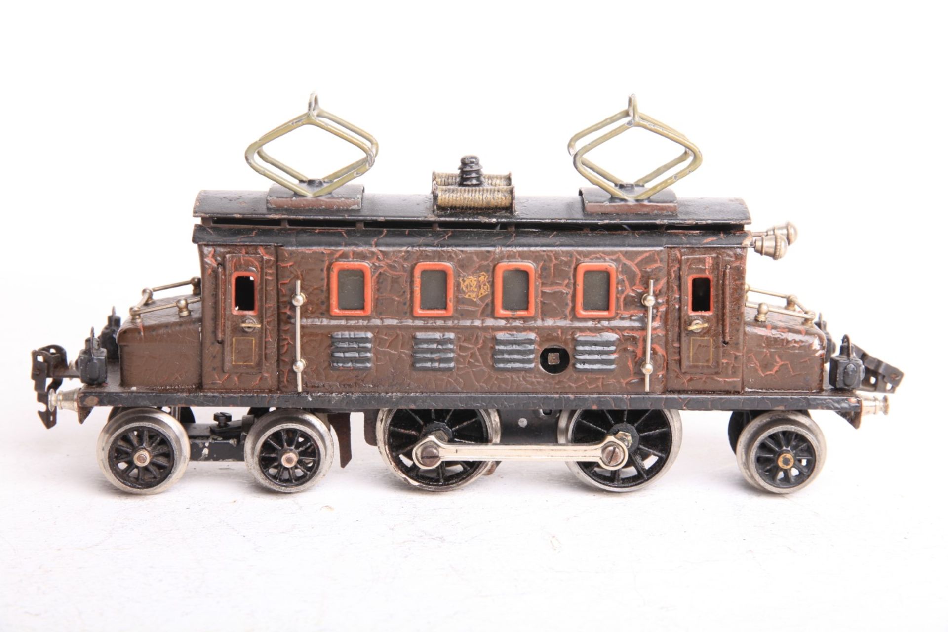 Märklin S 0, CS1020 1.Serie von 1927 mit beidseitige je 2 Stecklaternen. Braun handlackiert. Uhrwerk