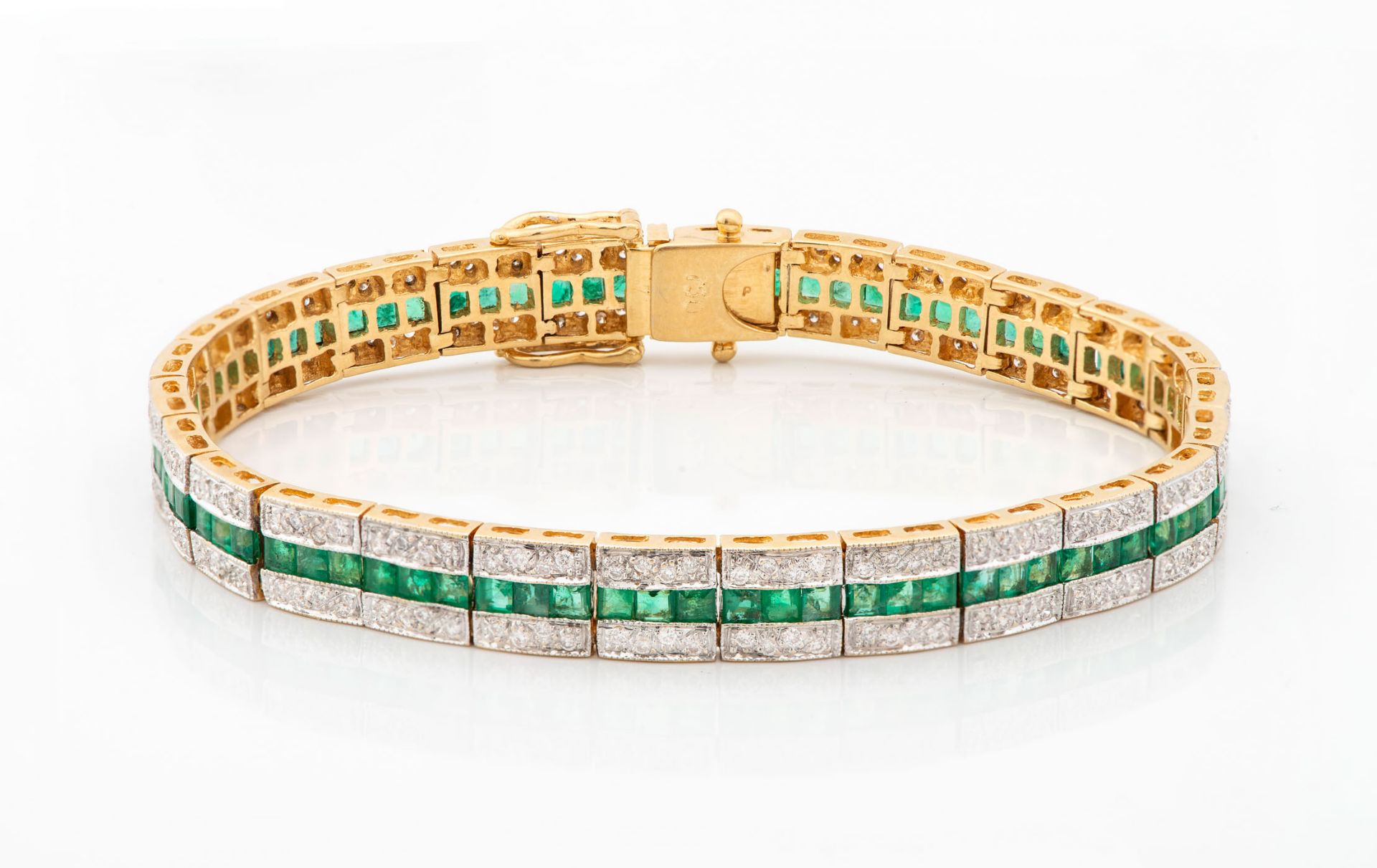 A Fine Art Deco 18K Gold Diamond and Emerald Tennis Bracelet - Image 2 of 3