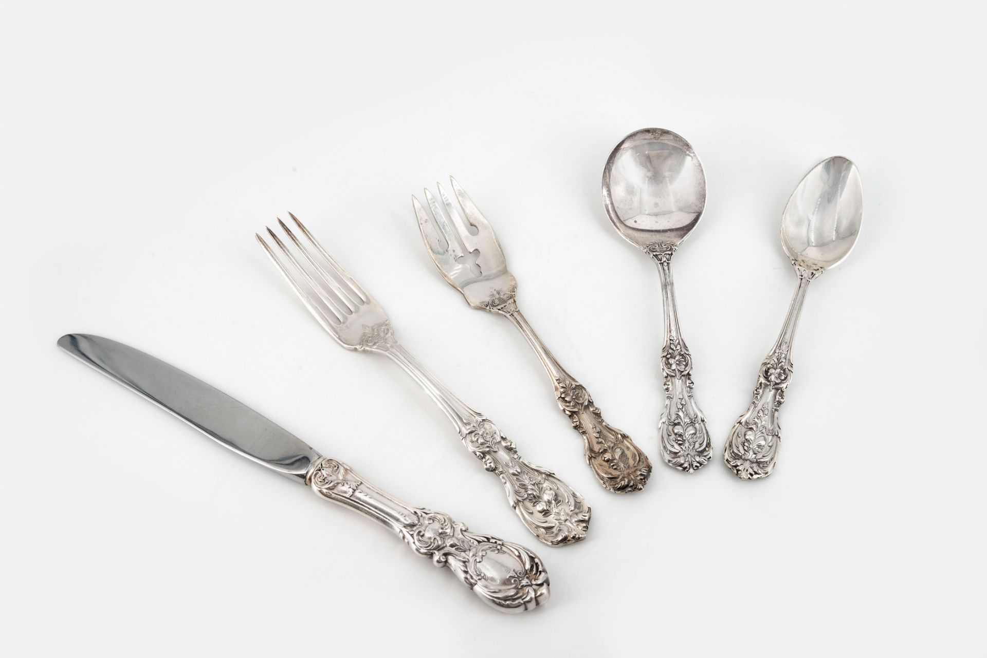 A Fine Sterling Silver Flatware for 12 by Reed&Barton, USA