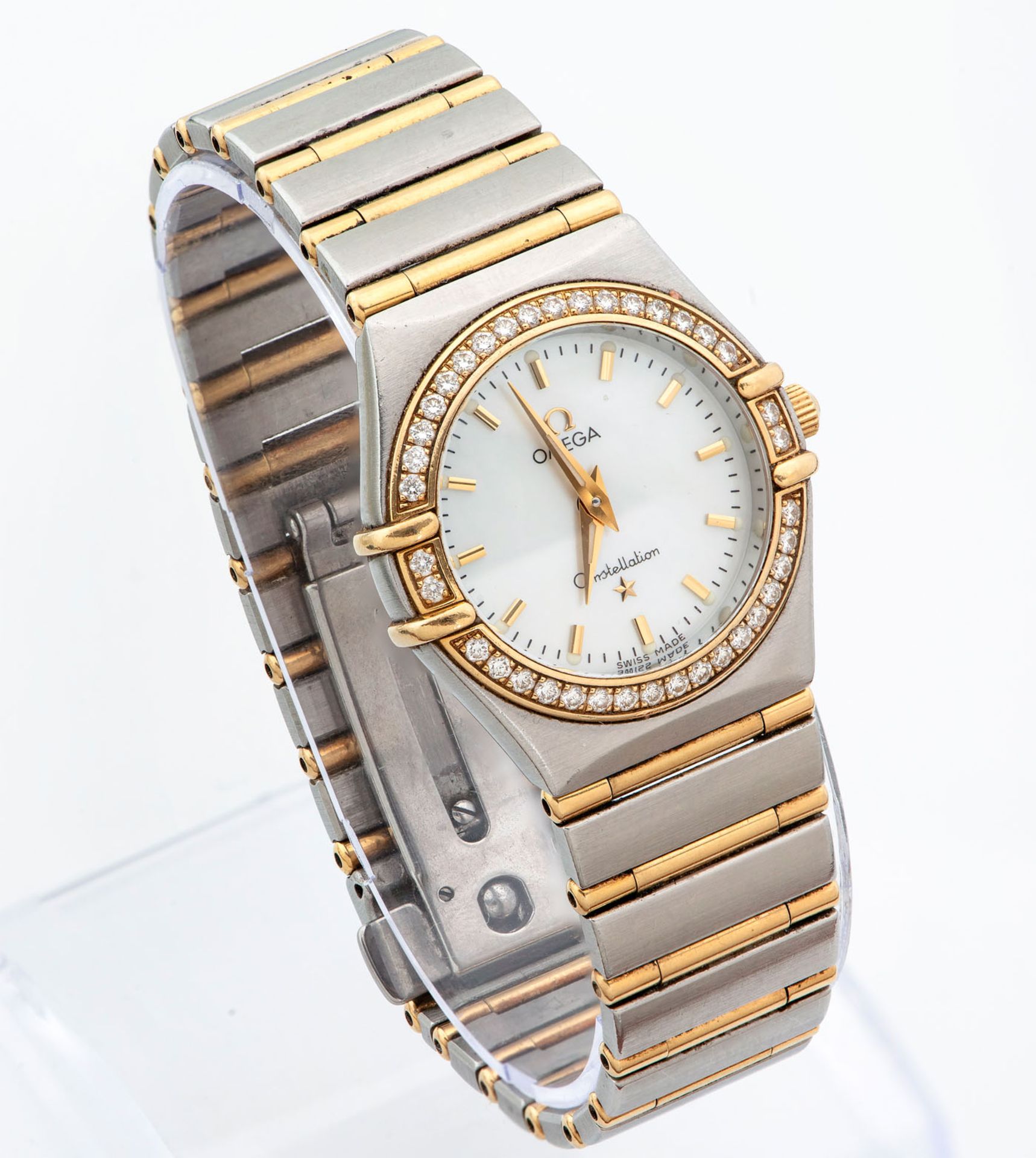 An Omega Constellation Gold and Diamond Bezel Ladies' Wristwatch