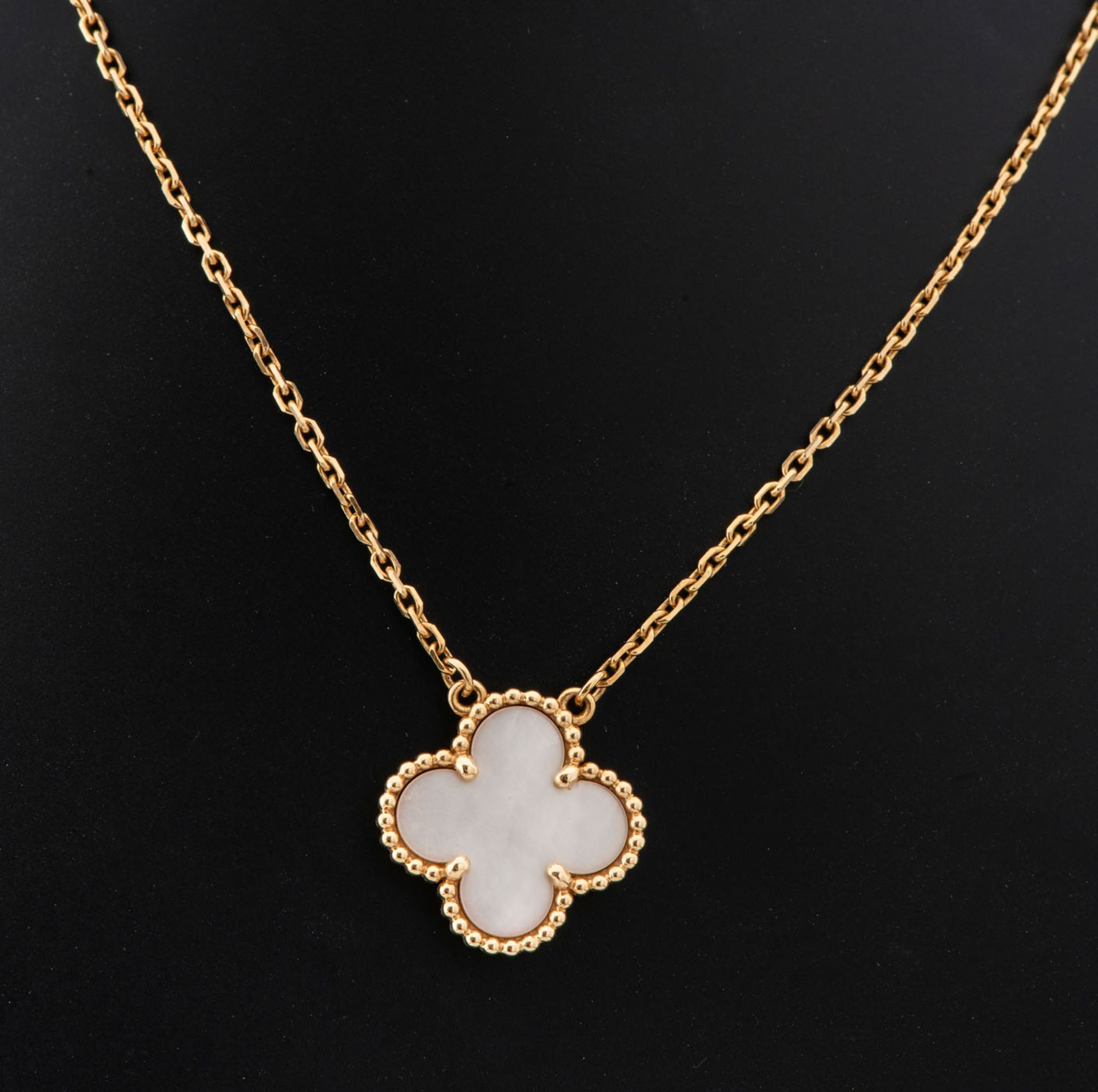 A Pair of Vintage Van Cleef and Arpels "Alhambra" 18K Gold and Mother of Pearl Pendant
