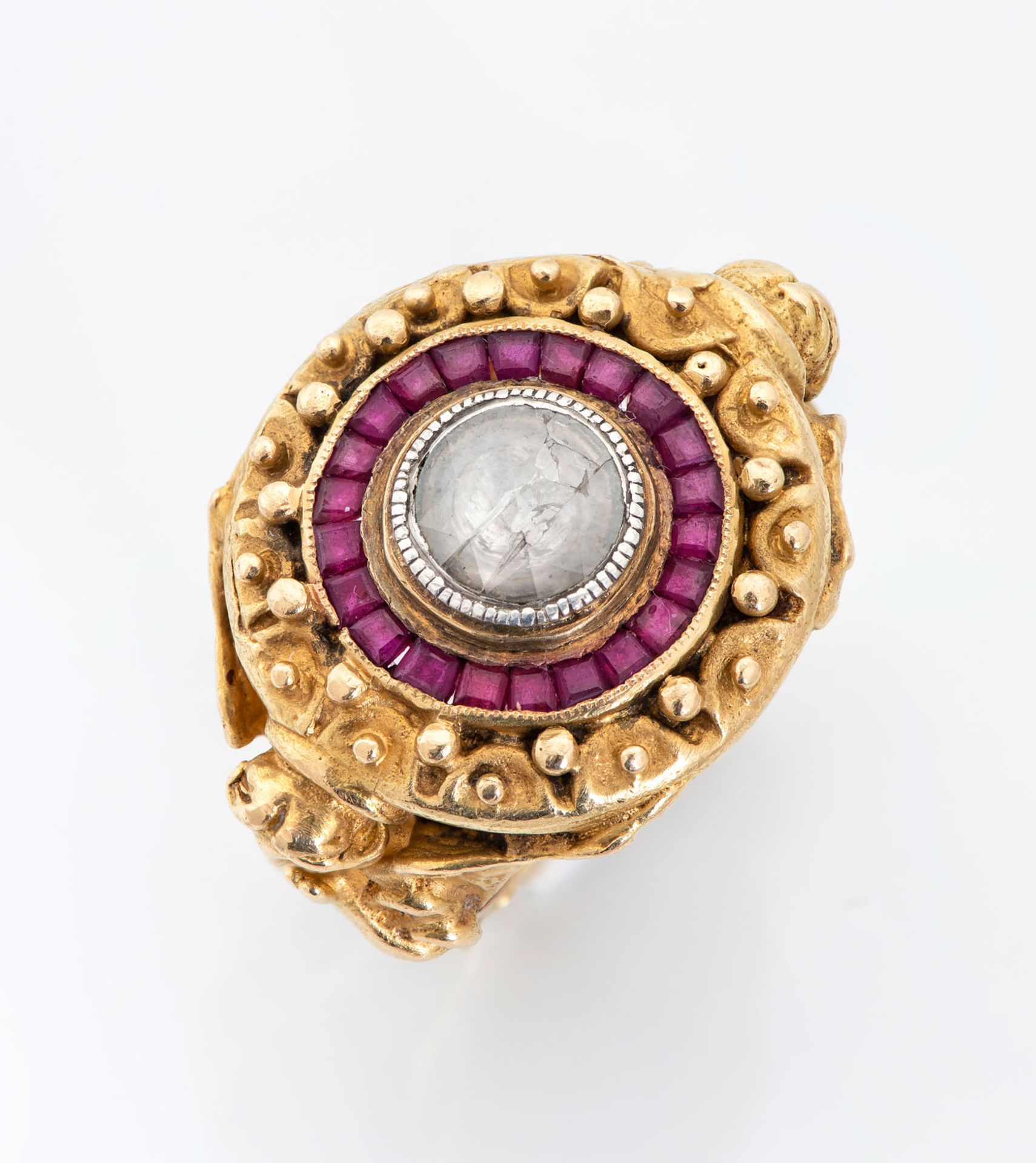 A Fine Baroque Style 18K Gold Rubies and Diamond Ring