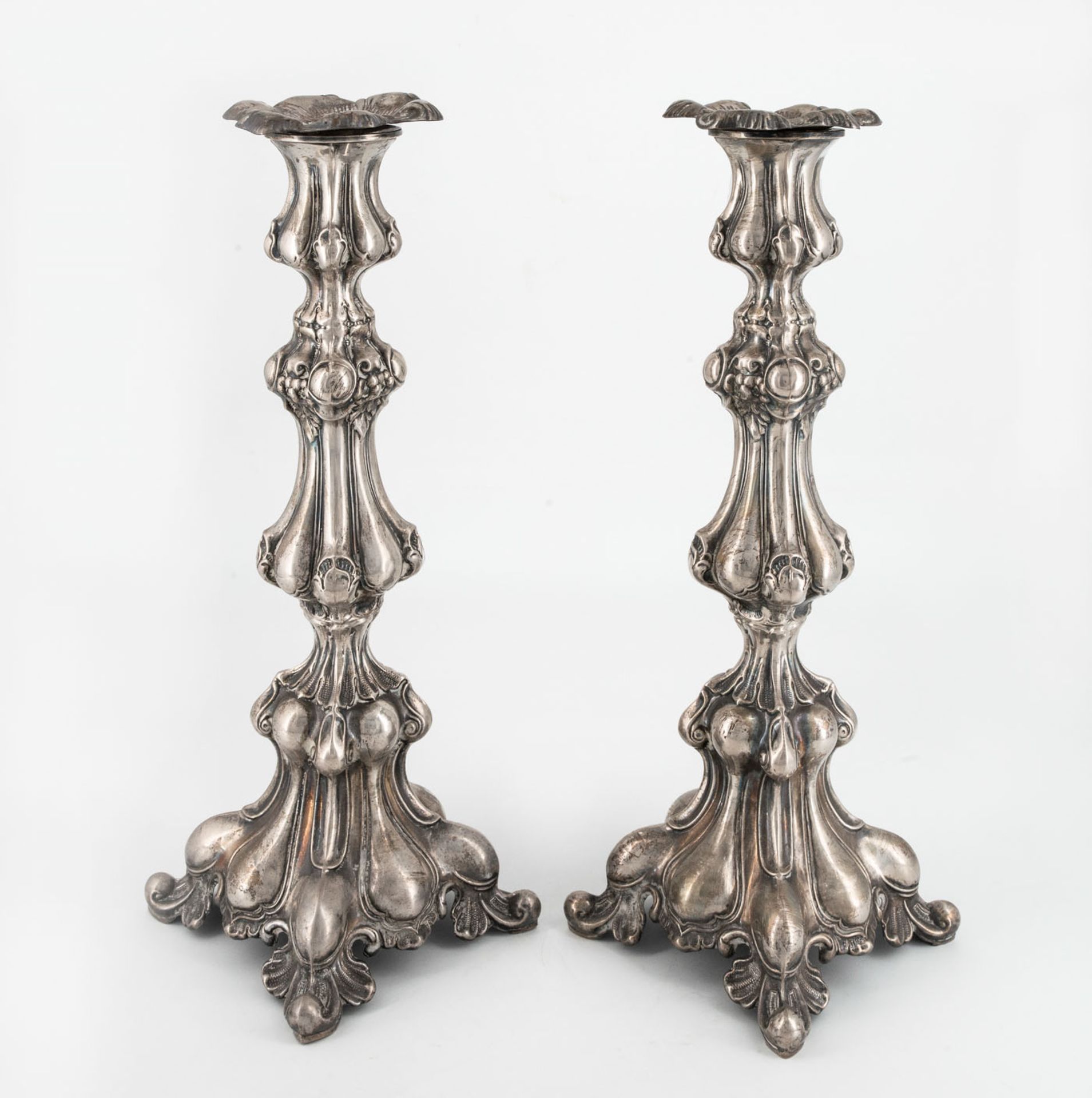 A Pair of Antique Silver Candlesticks