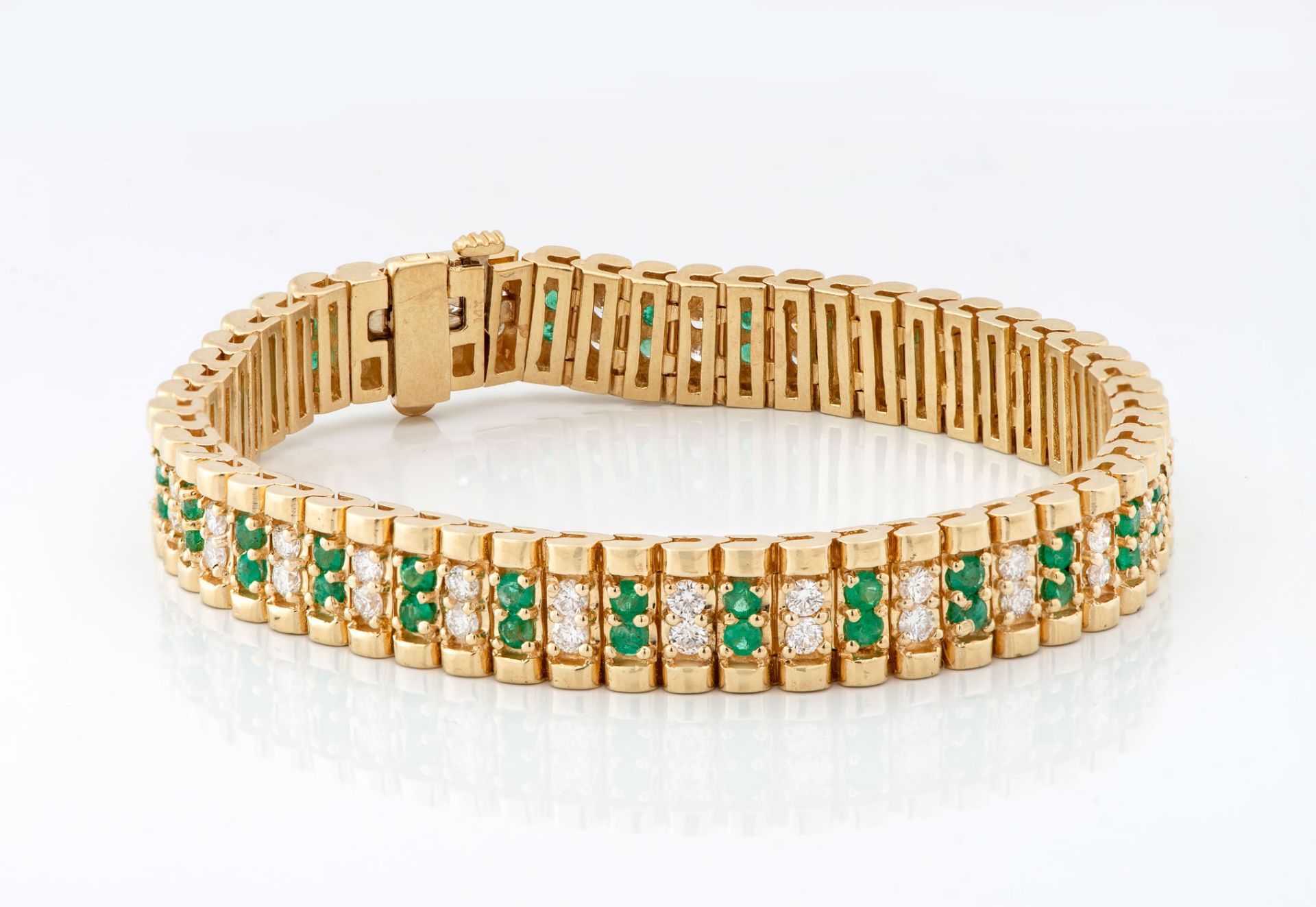A 14 Karat Gold Diamond and Emerald Tennis Bracelet - Image 2 of 4