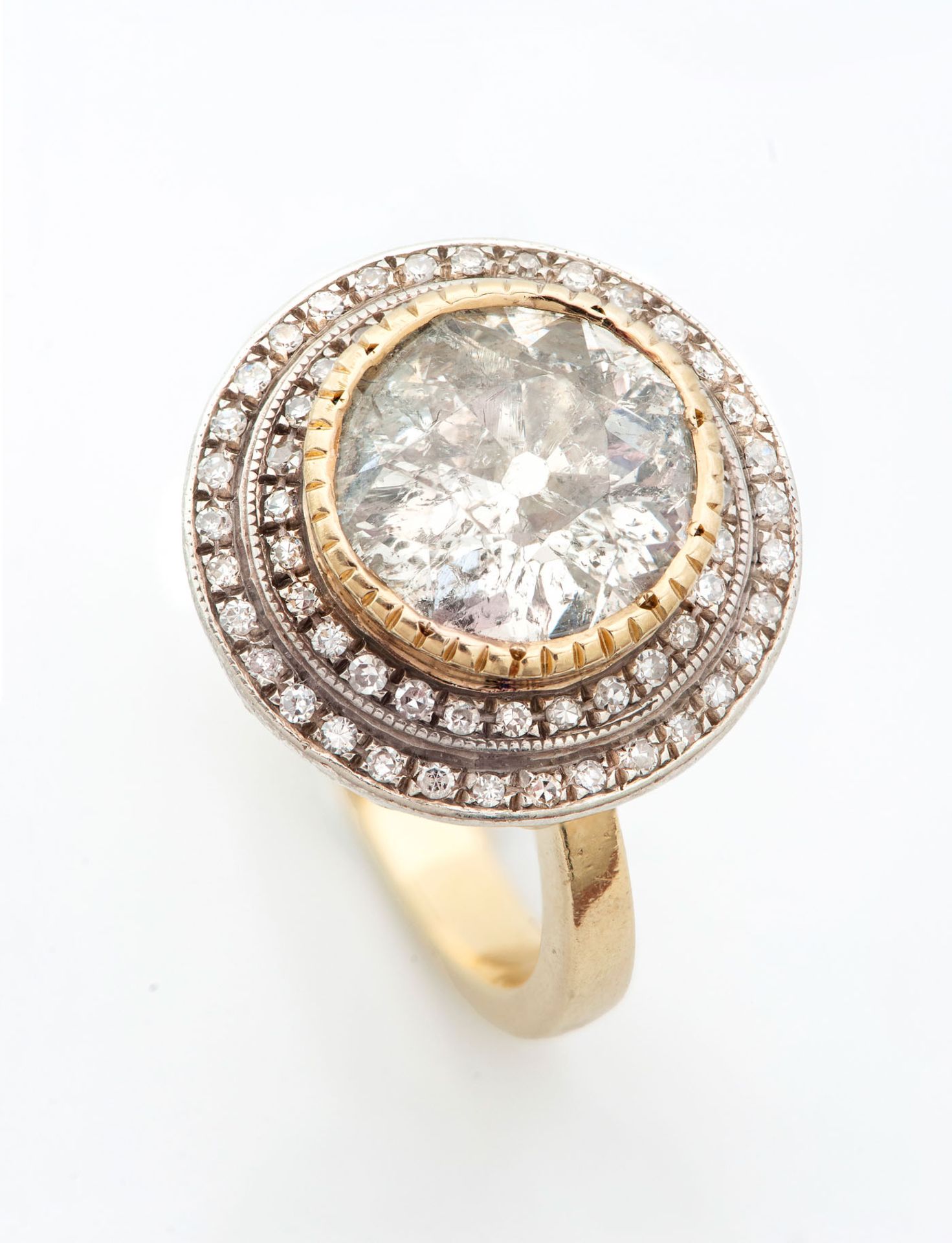 An 18K Two Tone Gold and Diamond Ring