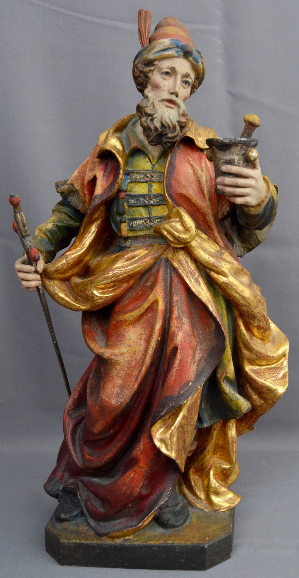 Holzgeschnitzte Figur "Der Apotheker"