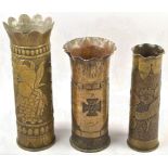 3 metal flower vases made of defused cartridge cases WWI