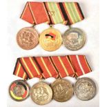 2 National Peoples Army medals clasps with 7 decorations