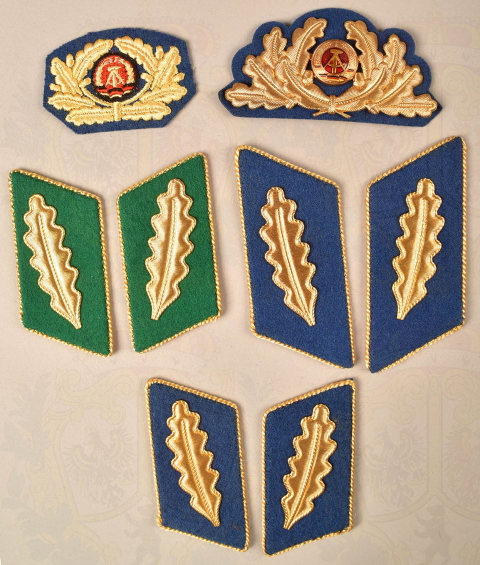 Grouping of uniform insignias National Peoples Police