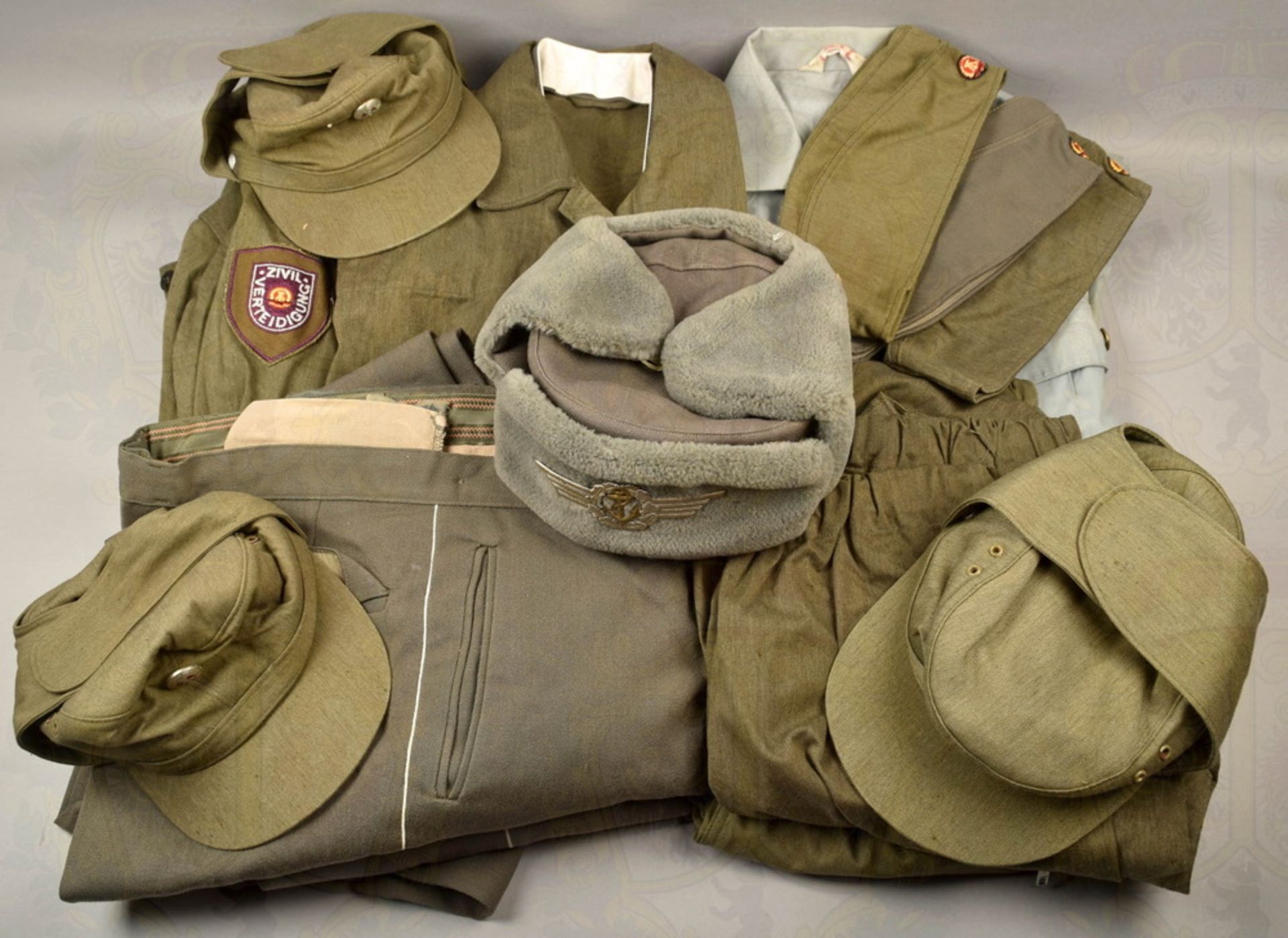 Collection of uniform pieces GDR Army and GDR civil defense