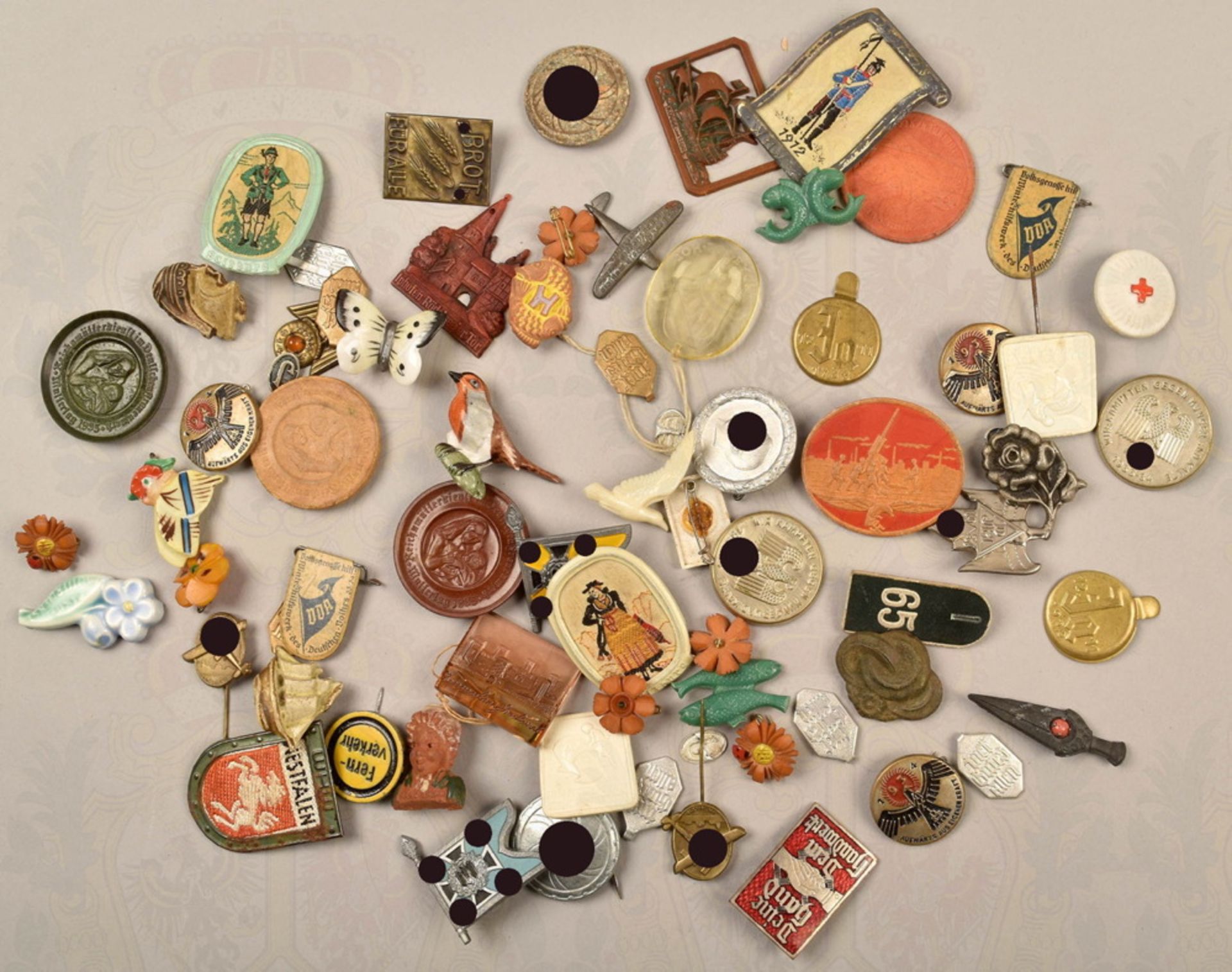 65 German Winter Relief badges 1933-1943