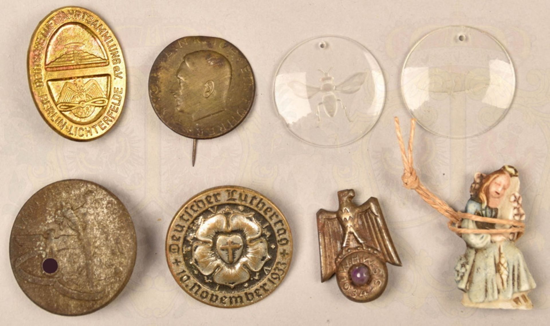 8 German tinnies and badges 1933-1939