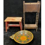 A Scandinavian painted bowl; a painted stool; an oak walking stick stand (3)