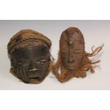 Decorative Tribal Art and the Eclectic Interior - a Chokwe mask, stylised features, 25cm long,