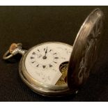 A French style silver hunter pocket watch, the case engraved with foliate blossom, vacant shield