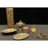 A papier-mâché miniature oval tray; a coquilla nut basket; a brass inkwell, a brass desk bell, a