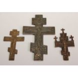 A Russian Orthodox cross, of Slavonic form, 15cm long; others (3)