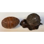 A Black Forest walnut inkwell; a coquilla egg pomander (2)