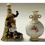 A Meissen scent bottle, painted with flowers, 6.5cm high; a French Sampson figural scent bottle,