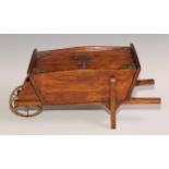 A Victorian oak novelty cigar box, as a wheel barrow, hinged cover enclosing an interior fitted as a