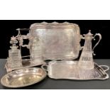 A Victorian plated tantalus, H.E.T. & Co., Sheffield, with a pair of cut glass canted square
