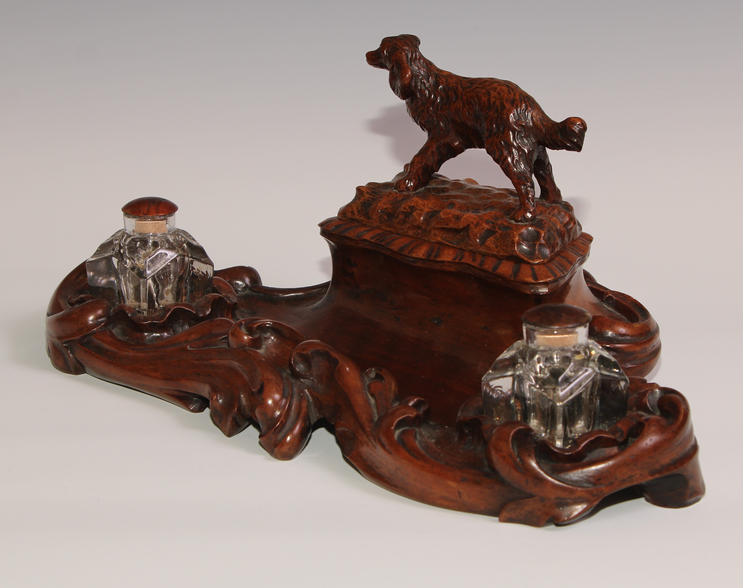 A 19th century walnut desk stand, carved in the Black Forest manner, the central compartment - Image 4 of 6