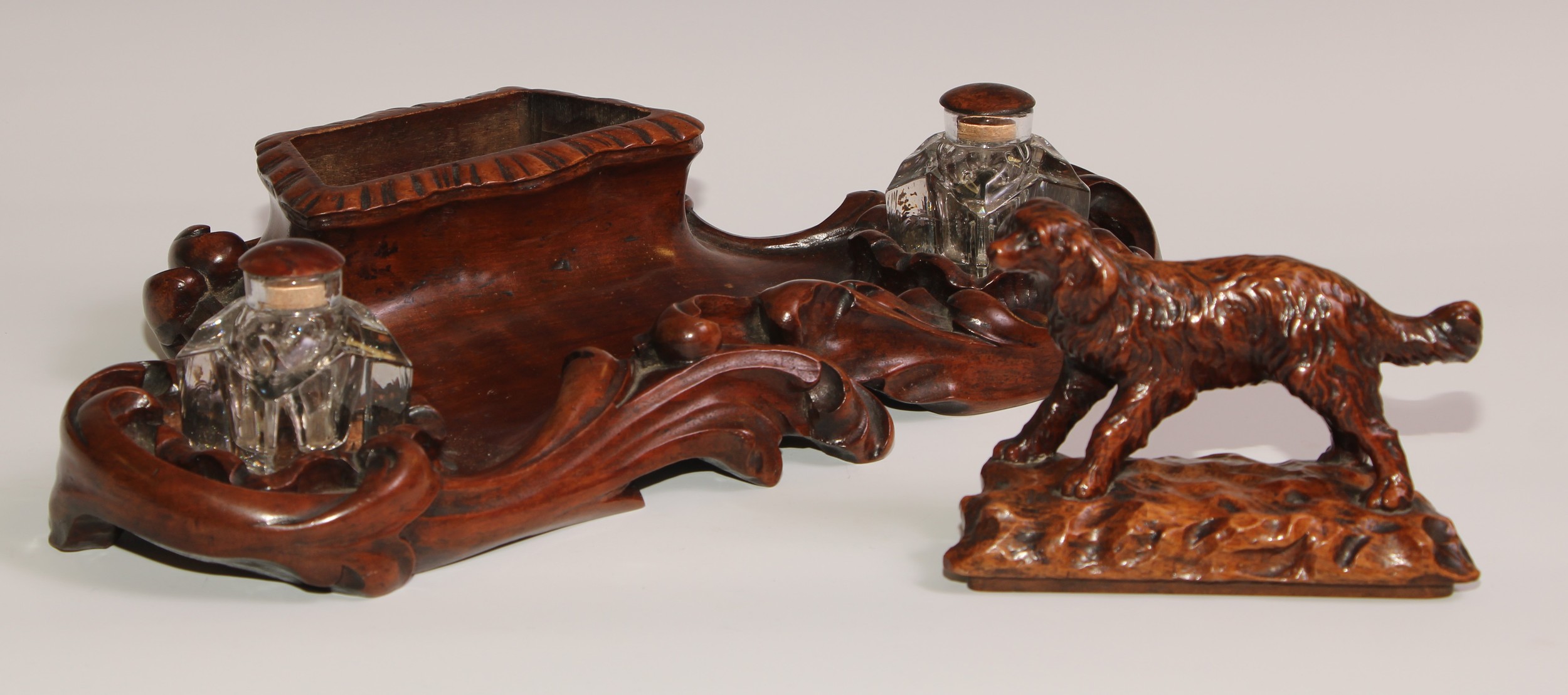 A 19th century walnut desk stand, carved in the Black Forest manner, the central compartment - Image 3 of 6