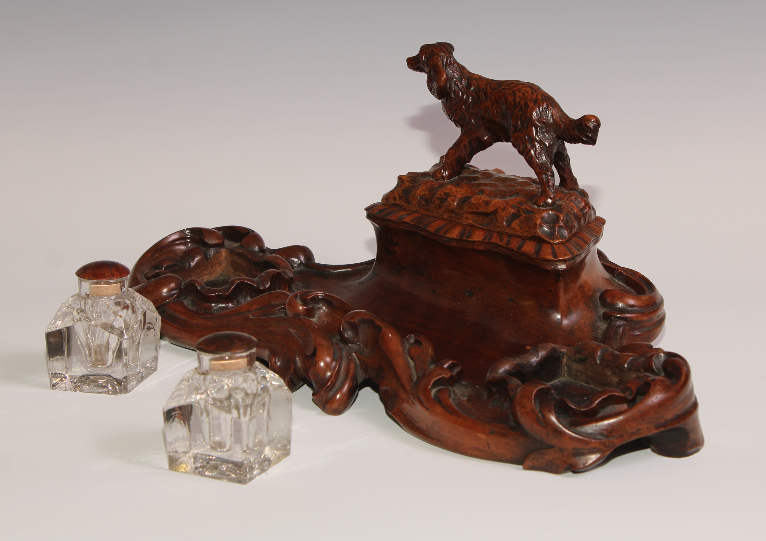 A 19th century walnut desk stand, carved in the Black Forest manner, the central compartment - Image 5 of 6