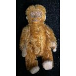 Toys & Juvenalia - a Schuco (Germany) miniature novelty orange mohair Monkey, painted metal face,