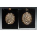 A pair of 19th century electrotype oval panels, in relief after the Old Master with the Adoration of