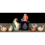 A pair of Royal Crown Derby paperweights, Derwent Goldcrests, gold stoppers; others, Penguin and