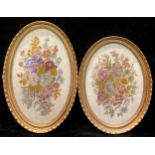 A pair of early 20th century petit-point oval embroidery pictures, framed, 17cm x 23cm