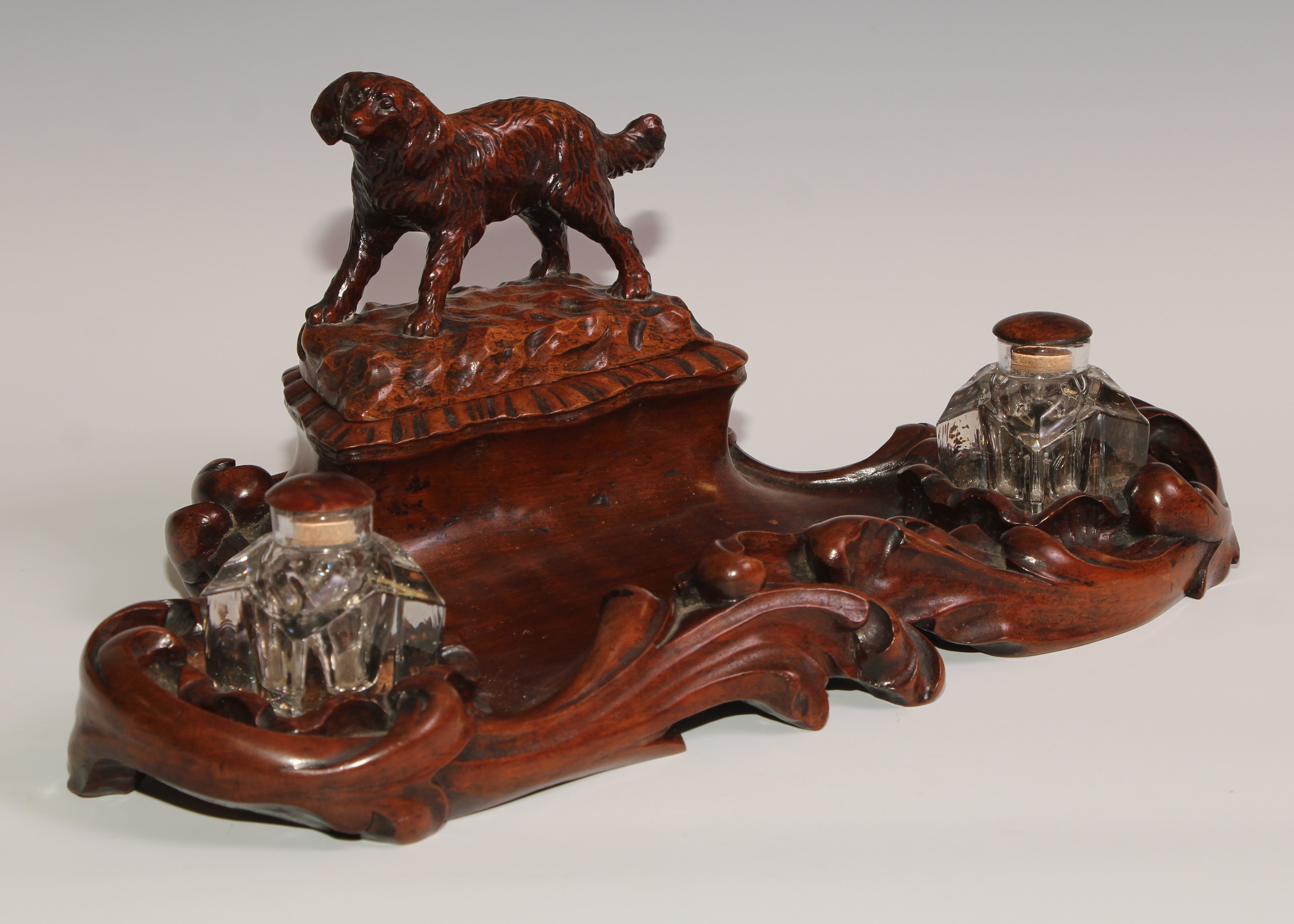 A 19th century walnut desk stand, carved in the Black Forest manner, the central compartment - Image 2 of 6
