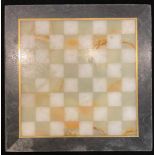 A pietra dura chess board, 24.5cm square