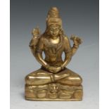 Indian School (19th century), a gilt bronze, Vishnu, seated in meditation upon a lion skin, a coiled