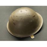 British MKIV Steel Helmet. Complete with liner and chinstrap. Dated 1952. Size 7 1/2.