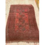 A Middle Eastern rectangular wool rug or carpet, 190cm x 137cm