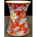 A Japanese waisted cylindrical vase, painted in polychrome enamels with bird amongst flowers, picked