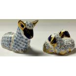 A Royal Crown Derby paperweight, Lamb, gold stopper; another, Twin Lambs, gold stopper (2)