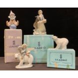 A Lladro figure, Goat Girl, 22cm, printed mark in blue, c.1971-74; others, Polar Bear with Inuit
