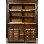 A Victorian oak Secretaire bookcase cabinet, three tier bookcase top, with moulded cornice, over a